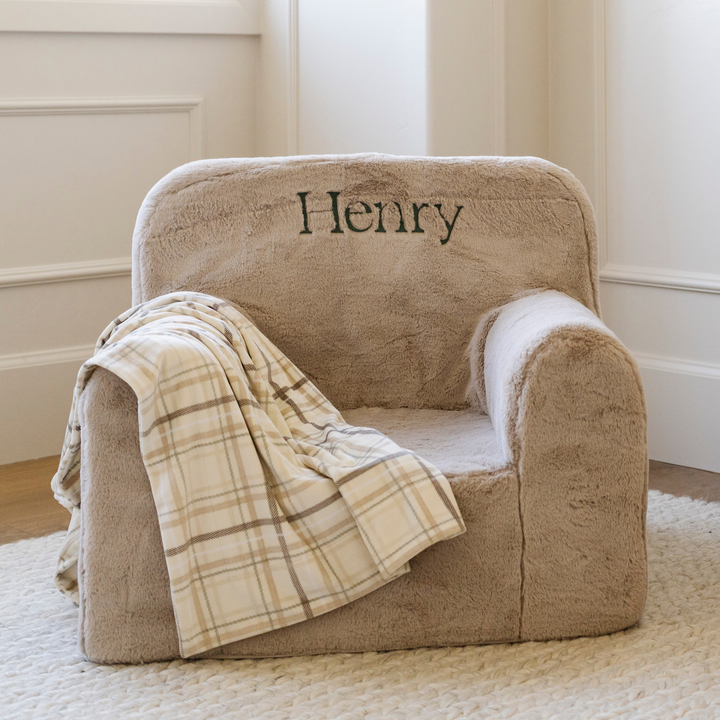 The Saranoni Minky Stretch Receiving Blanket in Plaid blends softness and designÑideal for baby boy blankets.