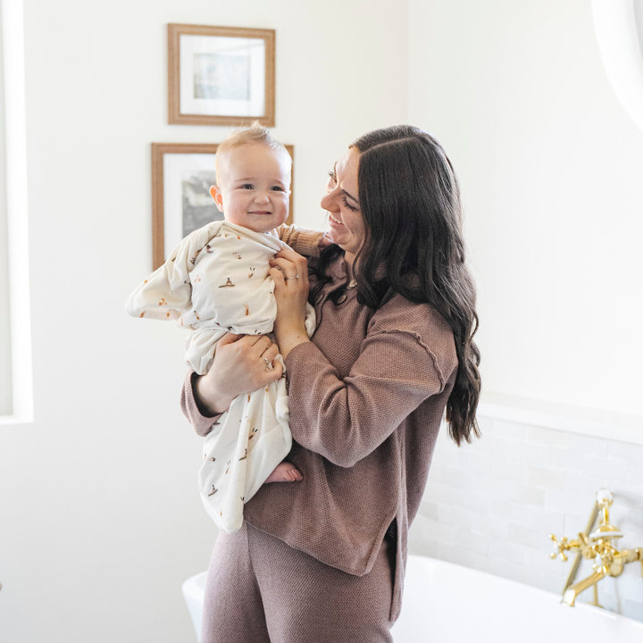 Keep toddlers cozy with Saranoni Hooded Towels in Poolside, hooded towels for kids after water play.