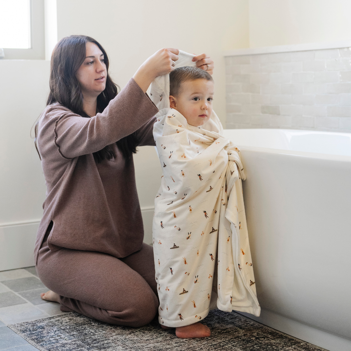 Bath time comfort comes with Saranoni Hooded Towels in Poolside, hooded baby towel for infants.