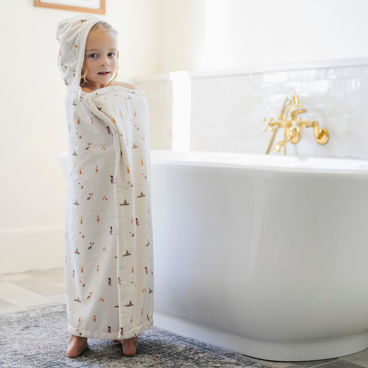 Wrap little ones in softness with Saranoni Hooded Towels in Poolside, baby hooded towels for every day.