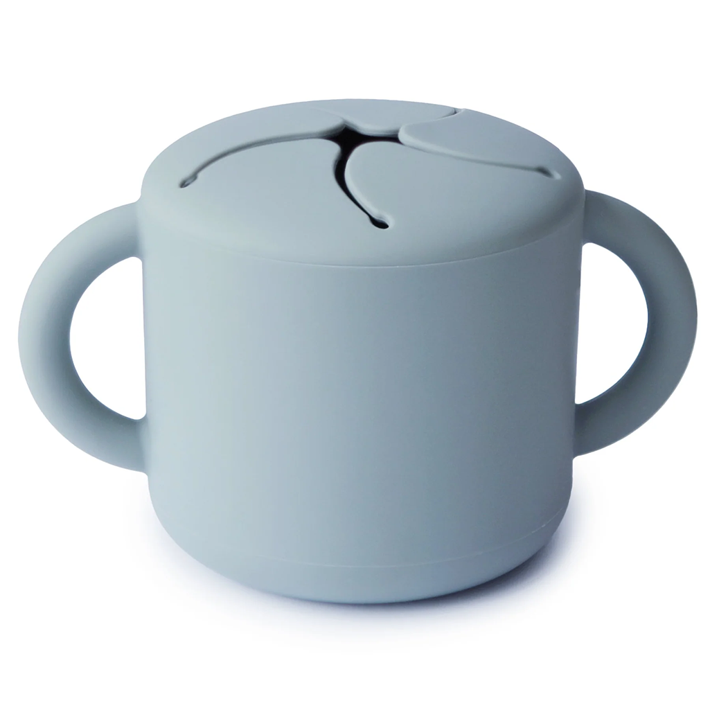 Mushie Silicone Snack Cup in Powder Blue offering a soft pastel blue for snack time on the go