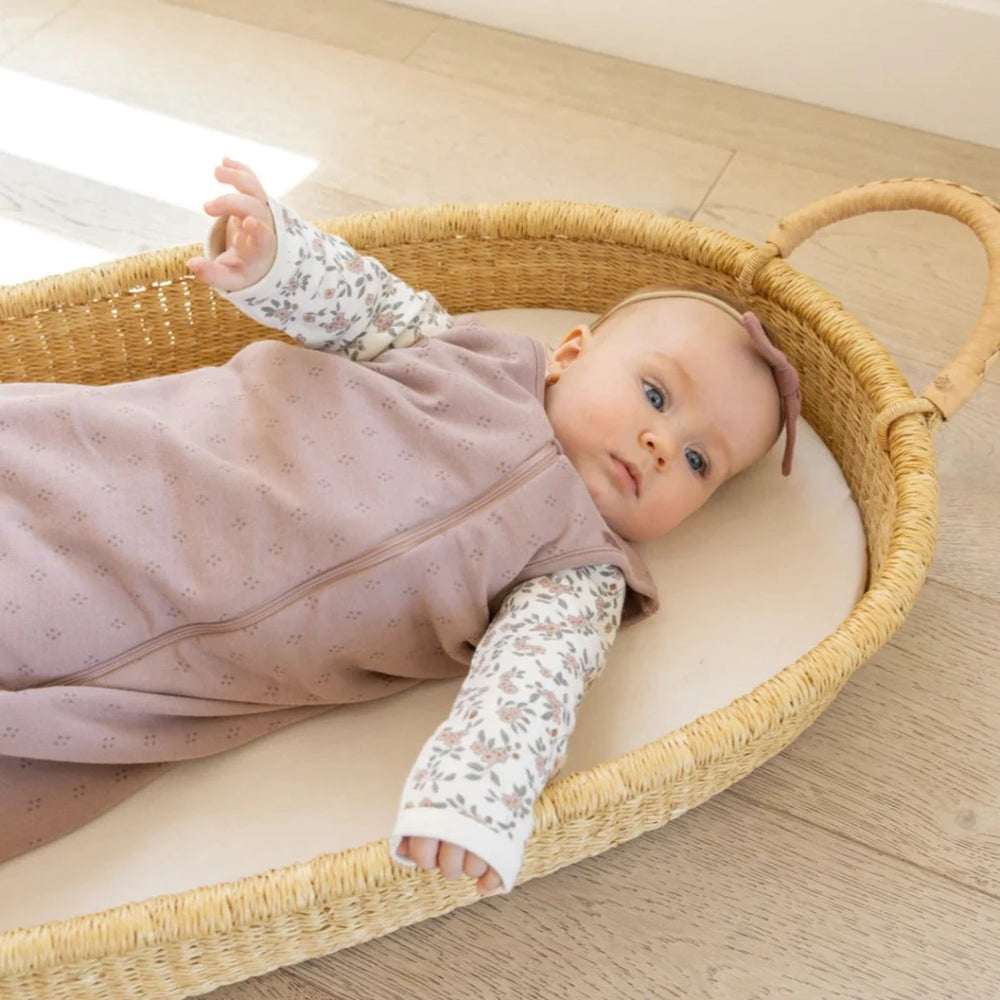 baby wearing quincy mae baby sleep sack in dotty