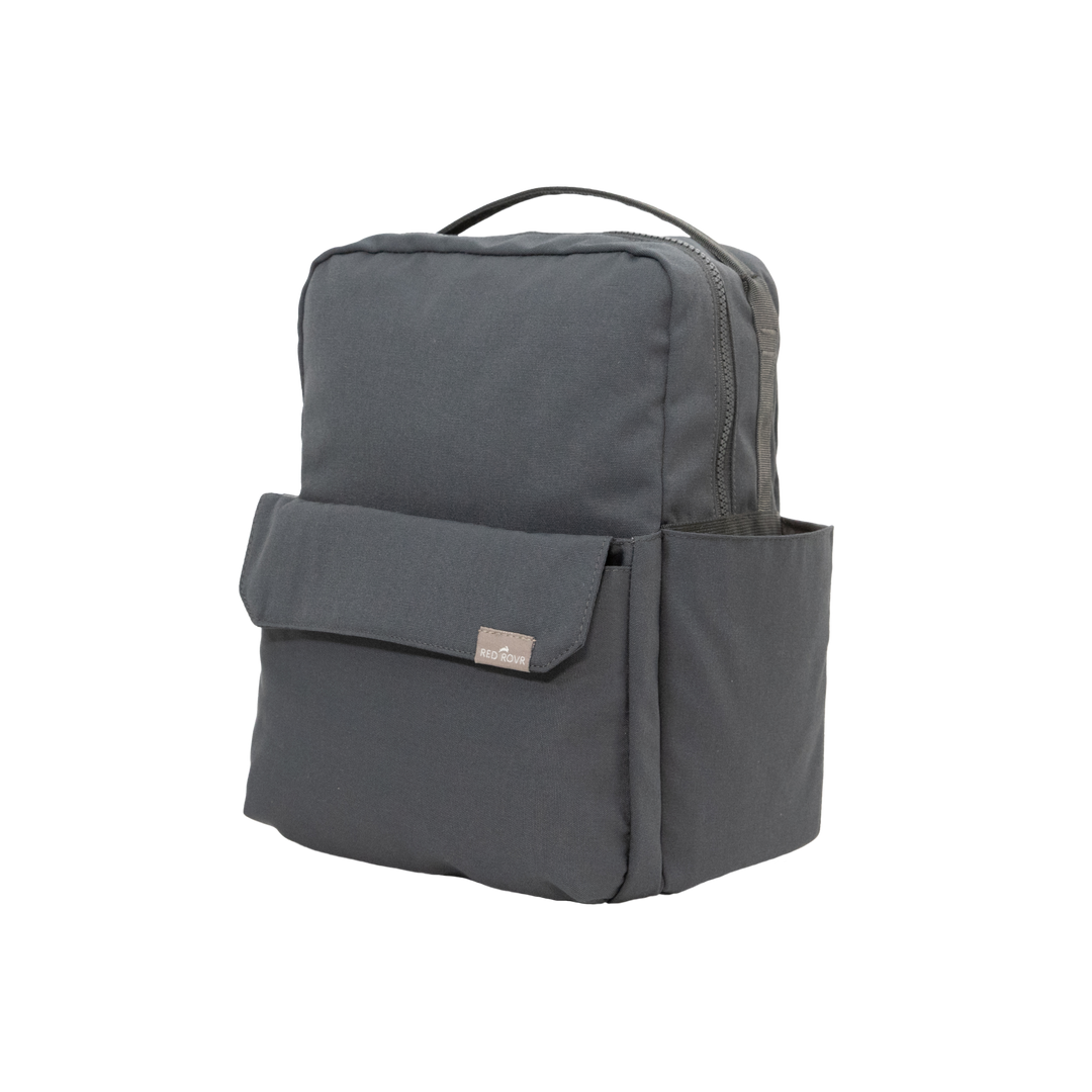 Top handle detail on the Little Unicorn Red Rovr Mini Roo Backpack - Charcoal, designed for easy carrying as a kid backpack.