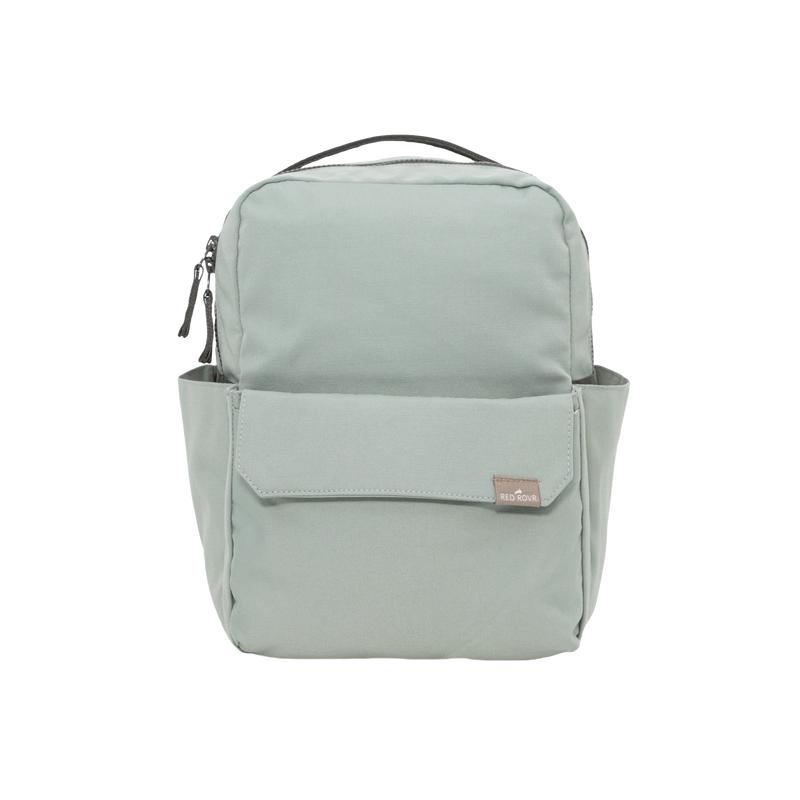 Little Unicorn Red Rovr Mini Roo Backpack in Sage displayed upright, a stylish and compact pick for kids backpacks.