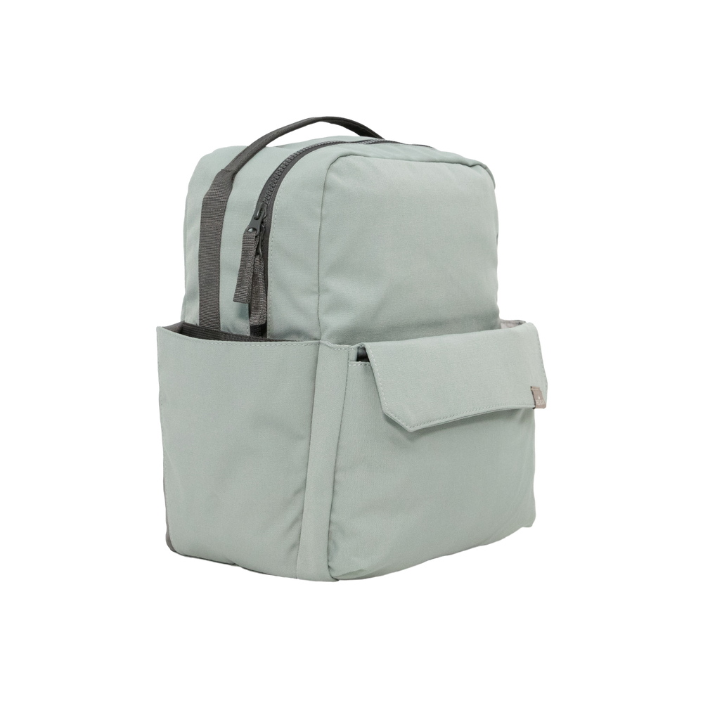 Front view of the Little Unicorn Red Rovr Mini Roo Backpack - Sage, a lightweight and durable kids backpack.