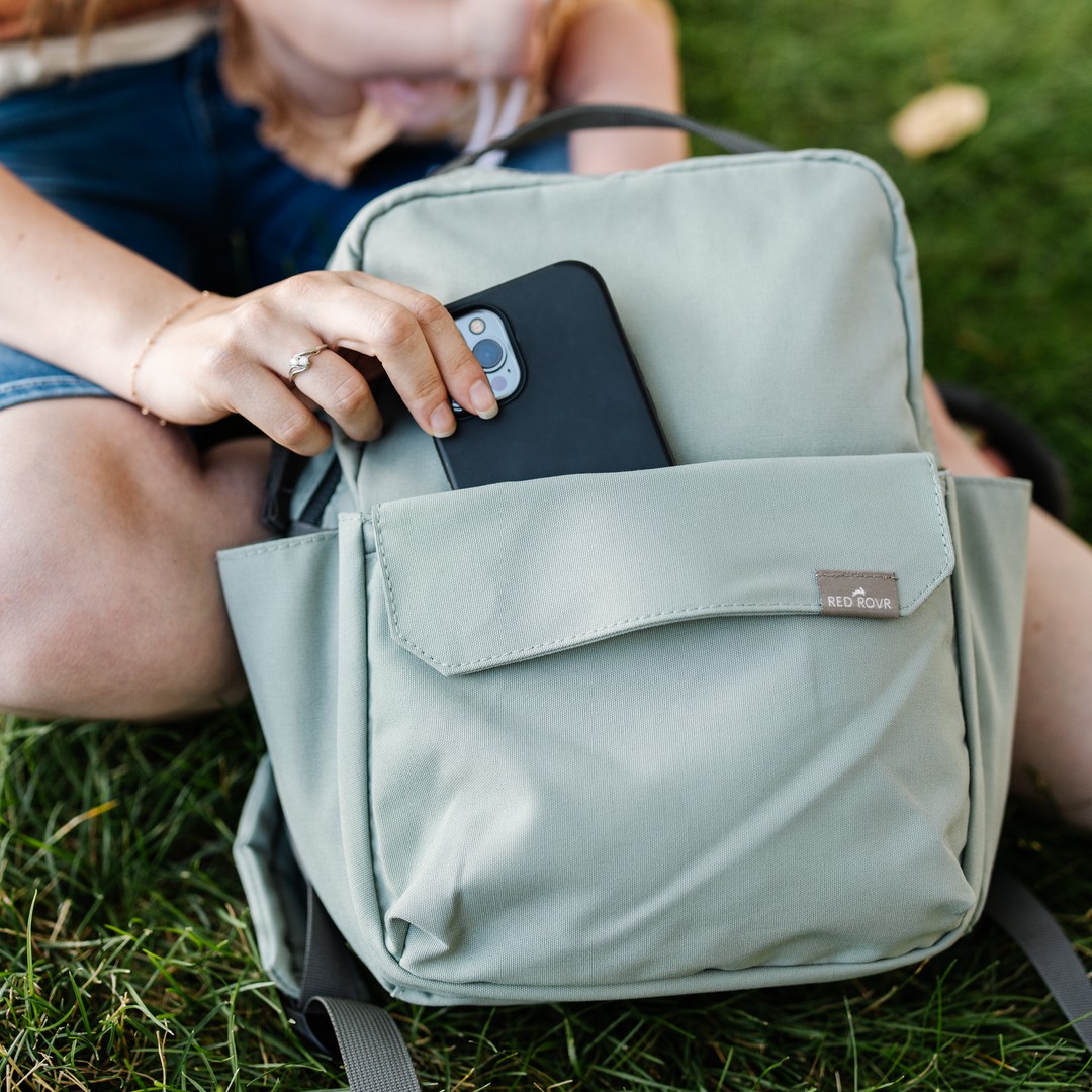 Interior pockets of the Little Unicorn Red Rovr Mini Roo Backpack - Sage, a great choice for a kids travel backpack.