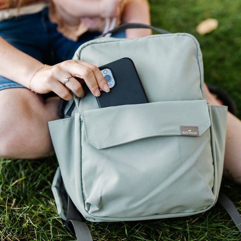 Interior pockets of the Little Unicorn Red Rovr Mini Roo Backpack - Sage, a great choice for a kids travel backpack.