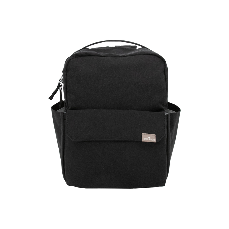 Little Unicorn Red Rovr Mini Roo Backpack - Black shown upright, a sleek and durable kids backpack for daily adventures.
