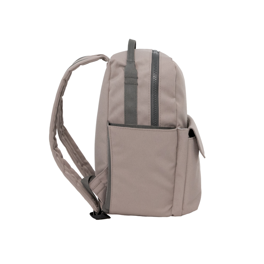 Compact and stylish, the Little Unicorn Red Rovr Mini Roo Backpack in Truffle is perfect for kid backpacks.