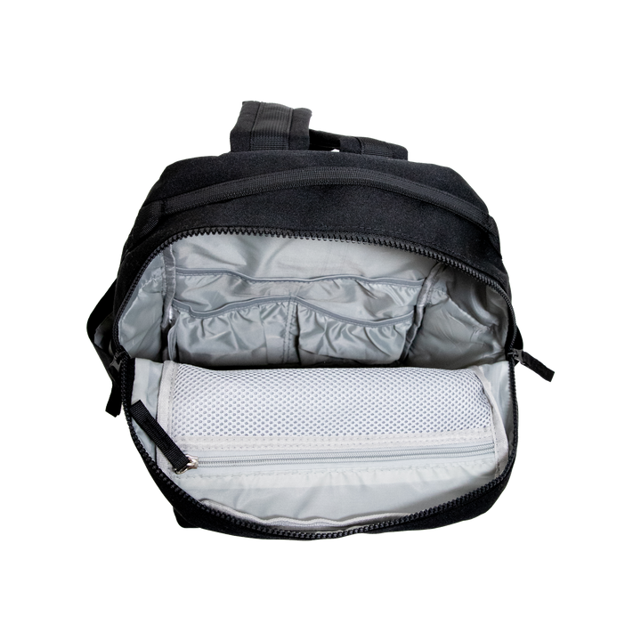 Side profile of the Little Unicorn Red Rovr Mini Roo Backpack in Truffle highlighting details for backpack kids.