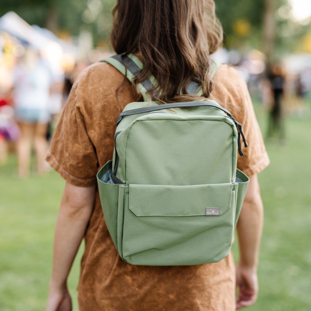 Back view of the Little Unicorn Red Rovr Mini Roo Backpack in Moss, crafted for comfort and durability in backpacks kids love.