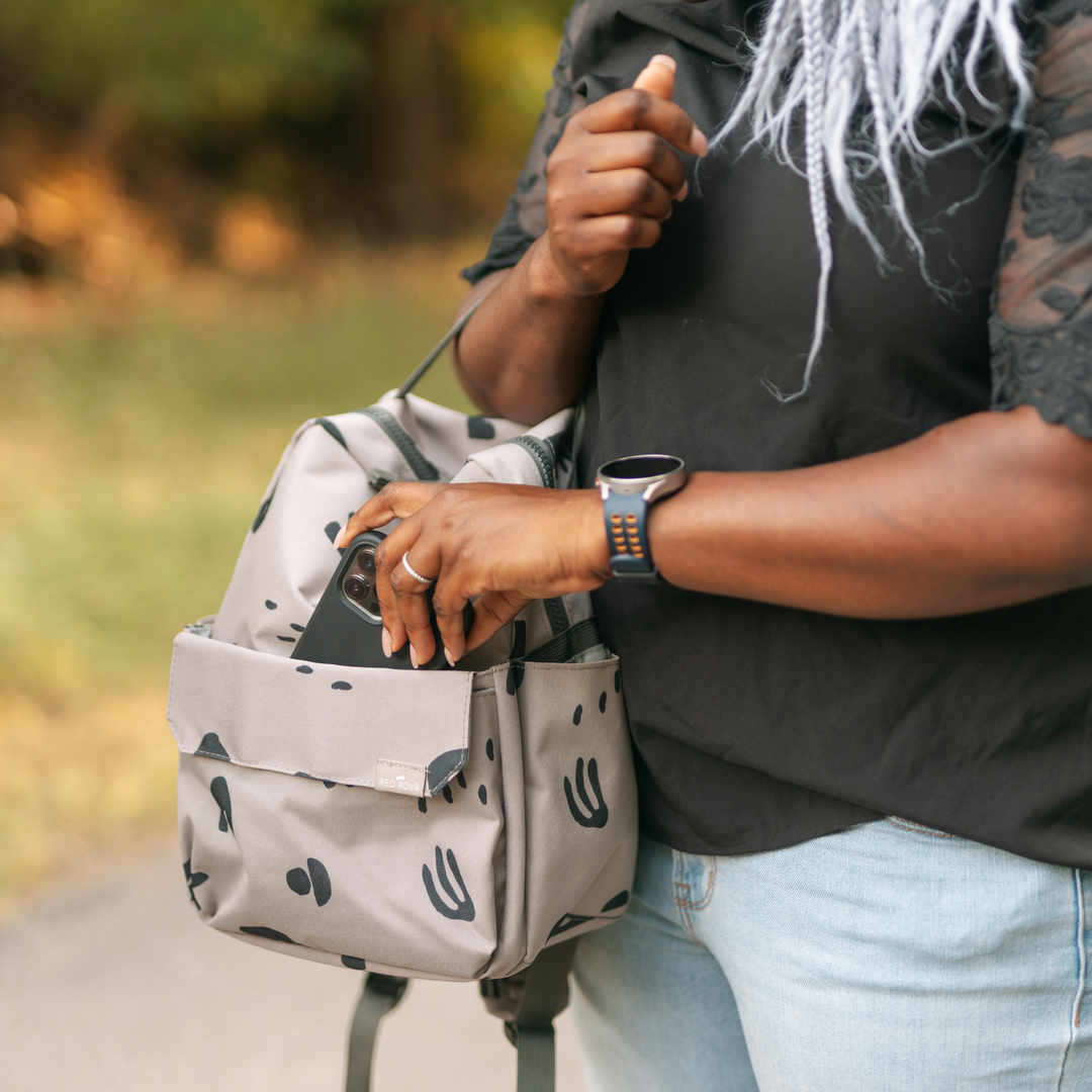 The Little Unicorn Red Rovr Mini Roo Backpack - Truffle Doodle blends style and function beautifully, perfect as a little kids backpack.