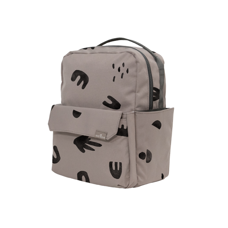 Perfect for little adventures, the Little Unicorn Red Rovr Mini Roo Backpack in Truffle Doodle is a comfortable and stylish kid backpack.