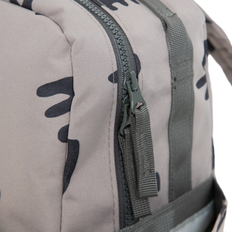 Compact and lightweight, the Little Unicorn Red Rovr Mini Roo Backpack - Truffle Doodle is thoughtfully designed as a backpack for kids.