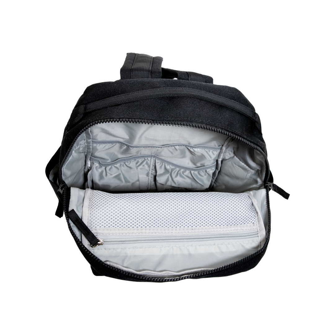 Built to last, the Little Unicorn Red Rovr Mini Roo Backpack in Truffle Doodle ranks among the best kids backpacks for school or play.