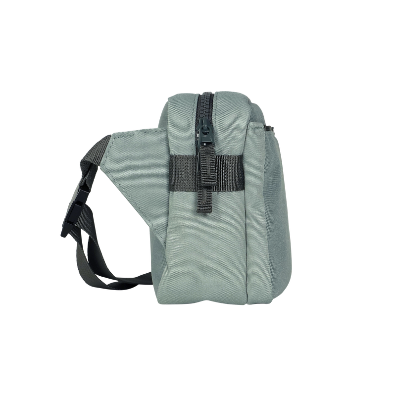 Carry essentials in the Little Unicorn Red Rovr Joey Belt Bag - Sage, practical large belt bag