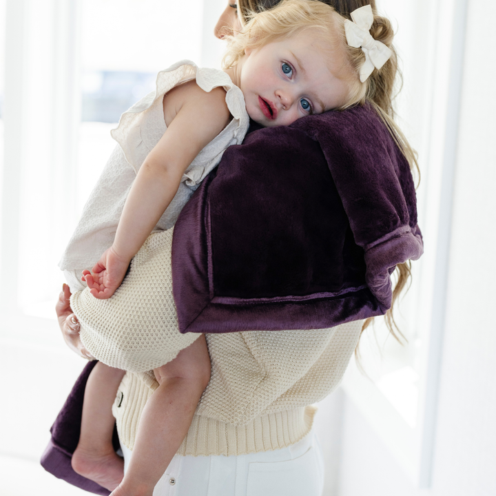The Deep Aubergine Saranoni Lush Receiving Blanket is perfect for girls, a soft baby girl blankets option.