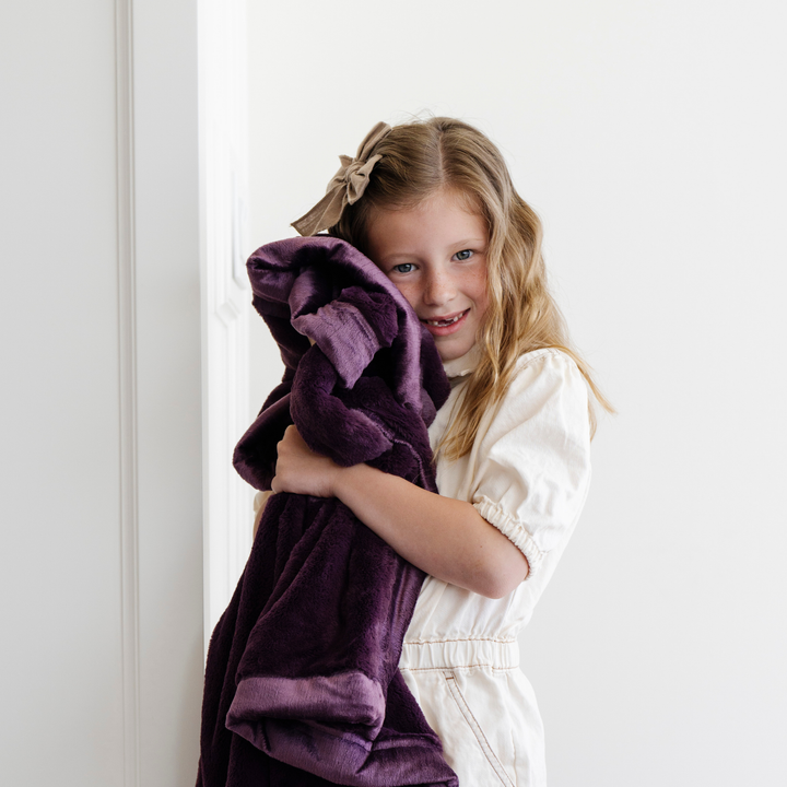 Little boys love the Aubergine Purple Saranoni Lush Receiving Blanket, an ideal baby boy blankets choice.