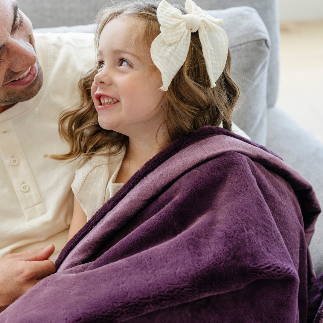 For cozy nap time, the Aubergine Saranoni Lush Receiving Blanket is a perfect baby blankets companion.
