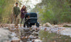 family outside with bob renegade stroller wagon and canopy bundle