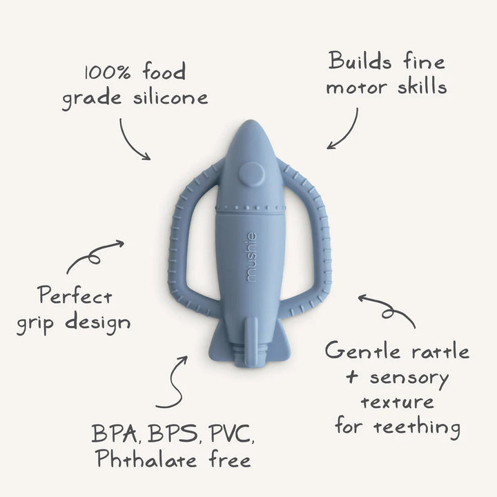 Mushie baby teething toy with a fun rattling rocket design