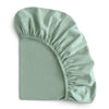 stretchy crib sheet in roman green folded