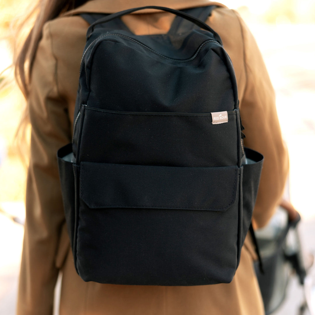 Lightweight and sleek, the Little Unicorn Red Rovr Roo Backpack - Black is among this year’s best kids backpack designs.