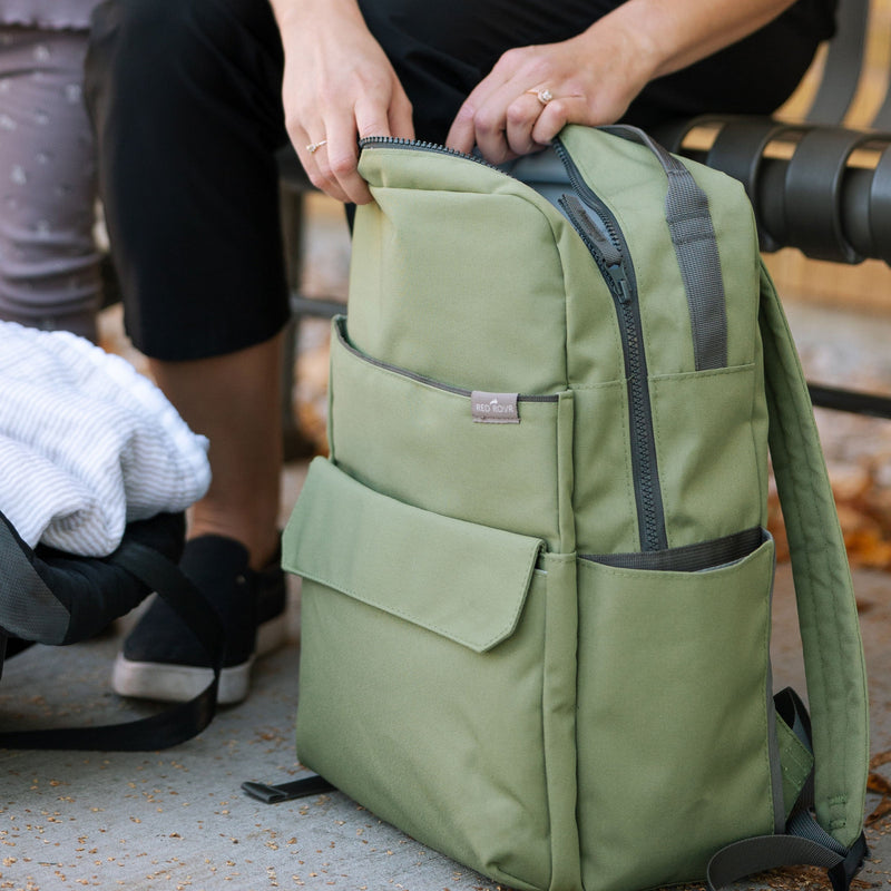 Designed with families in mind, the Little Unicorn Red Rovr Roo Backpack - Moss makes a practical and stylish little kids backpack.