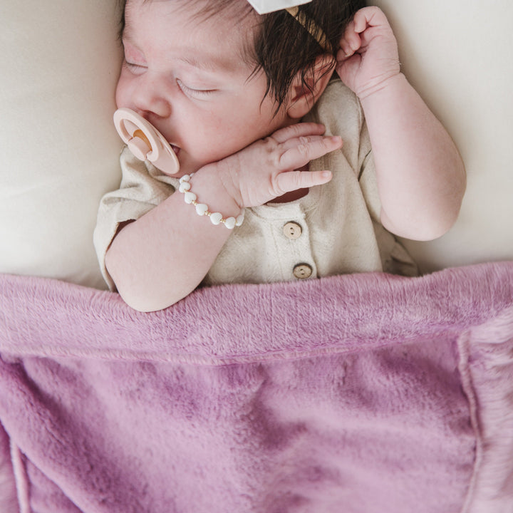 Nothing compares to the cloud-like feel of the Saranoni Lush Mini Blanket in Fairy Wings for Baby girl blankets.