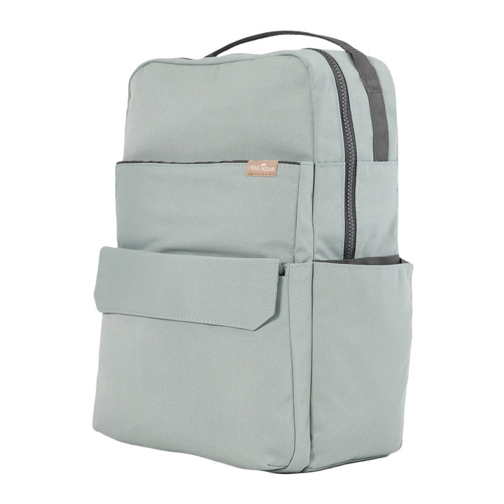 Little Unicorn Red Rovr Roo Backpack - Sage shown with front pocket detail, a versatile and trendy backpack kids will love.