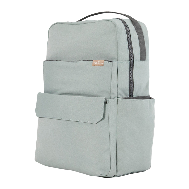 Little Unicorn Red Rovr Roo Backpack - Sage shown with front pocket detail, a versatile and trendy backpack kids will love.