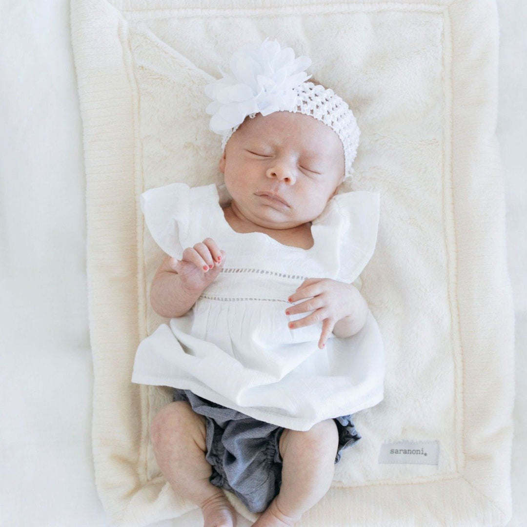 Natural Saranoni Lush Mini Blanket brings reliable plushness and shows up often in Soft baby blankets lists.