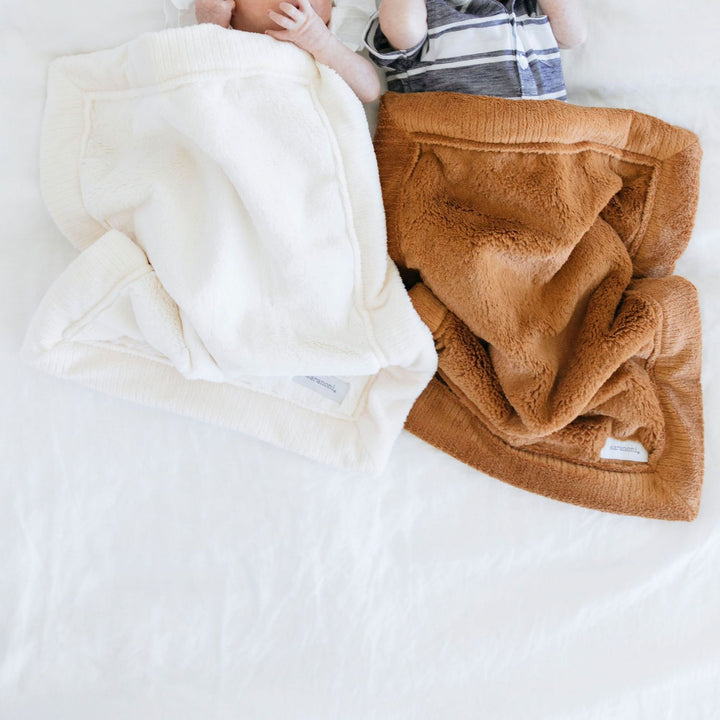 Camel Saranoni Lush Mini Blanket provides plush comfort and pairs perfectly with Baby boy blankets styles.