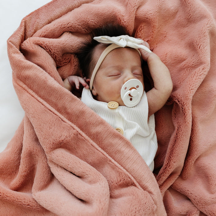 Soft Clay Lush Receiving Blanket from Saranoni ensures gentle warmth, ideal among receiving blankets.