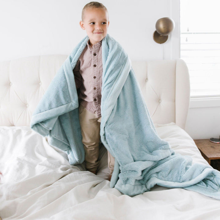 Saranoni Lush Toddler Blanket in Chambray is a best blanket for toddlers that combines style and warmth.