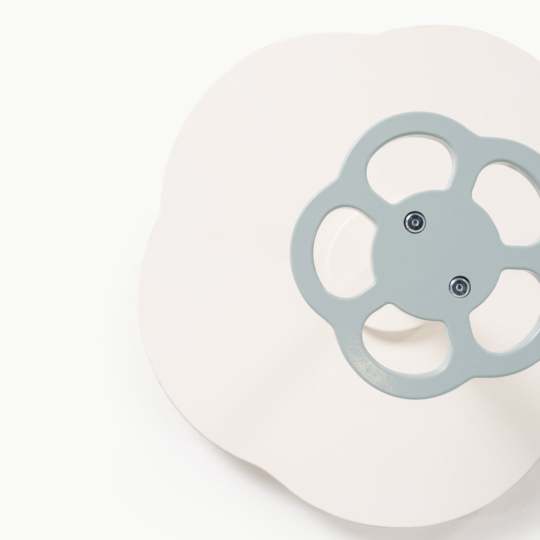 Overhead view of the grey wheel handle on this wooden Sit and Spin from Gathre