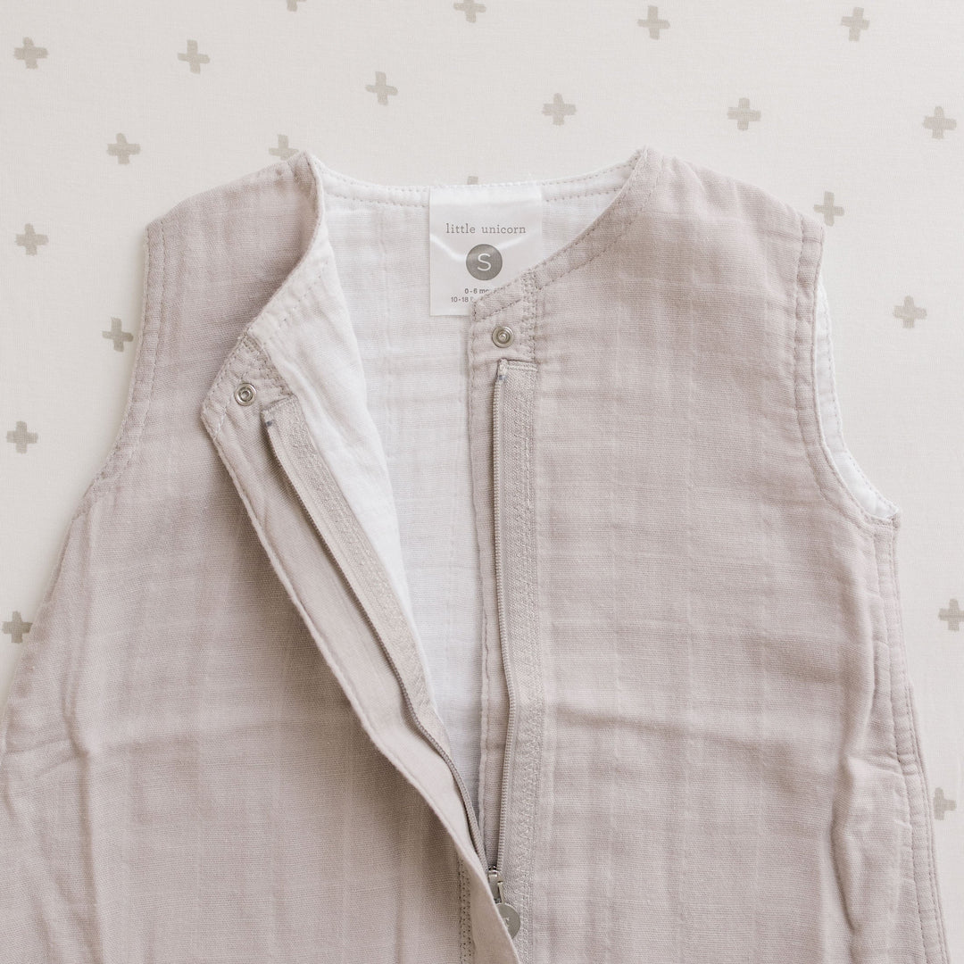 Detail shot of Little Unicorn Cotton Muslin Sleep Bag - Porpoise, sleep bag baby highlighting fabric texture.