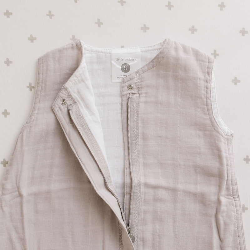 Detail shot of Little Unicorn Cotton Muslin Sleep Bag - Porpoise, sleep bag baby highlighting fabric texture.
