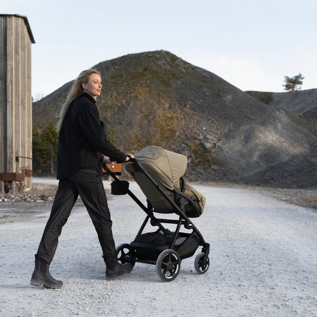 Thule Charm Stroller lifestyle photo, full-size stroller from birth
