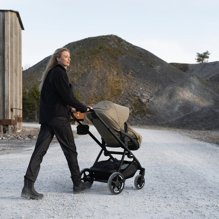 Thule Charm Stroller lifestyle photo, full-size stroller from birth