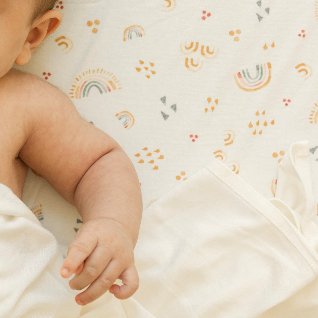 Little Unicorn Rainbows Stretch Knit Crib Sheet, soft crib sheets girl or boy will love for a comfy bedtime.