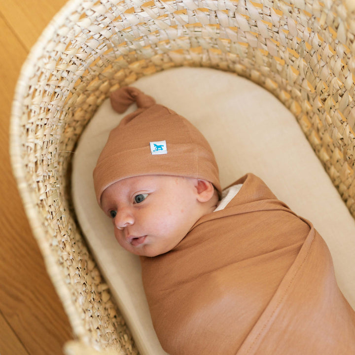 Little Unicorn Organic Stretch Knit Swaddle Blanket in Terracotta, versatile swaddle cloth muslin.