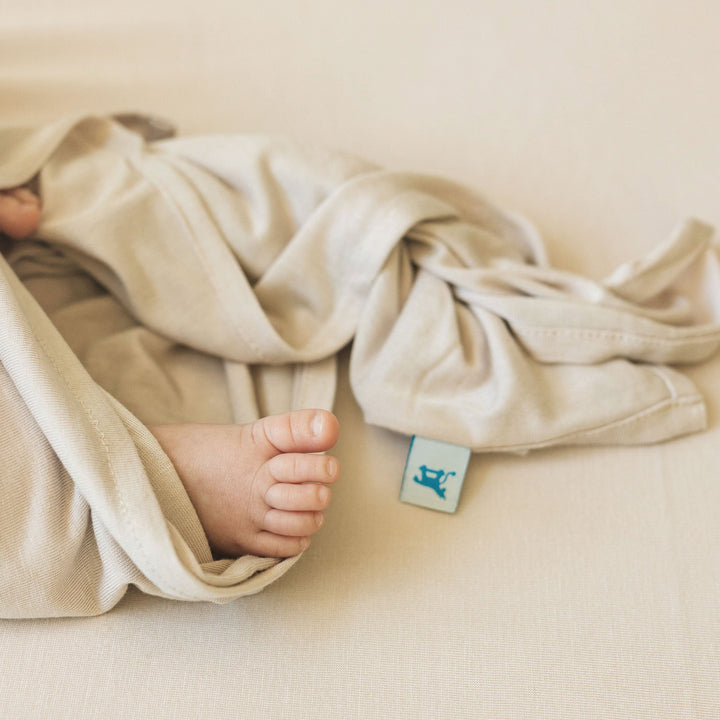 Little Unicorn Organic Stretch Knit Swaddle Blanket in Pebble, versatile swaddle cloth muslin.