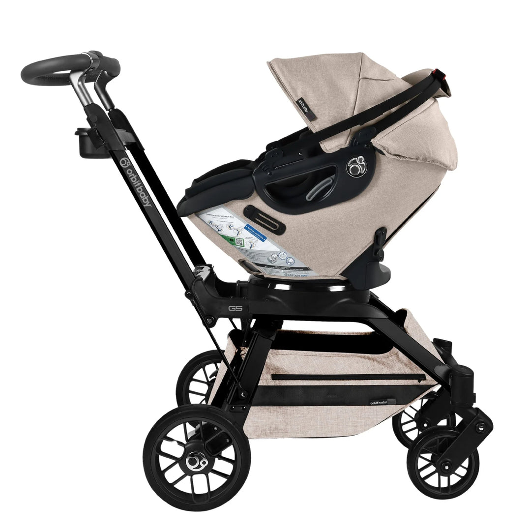 Orbit Baby Stroll & Ride Travel System in Melange Flax/Black combines modern design and practicality as a versatile stroller carseat combo.