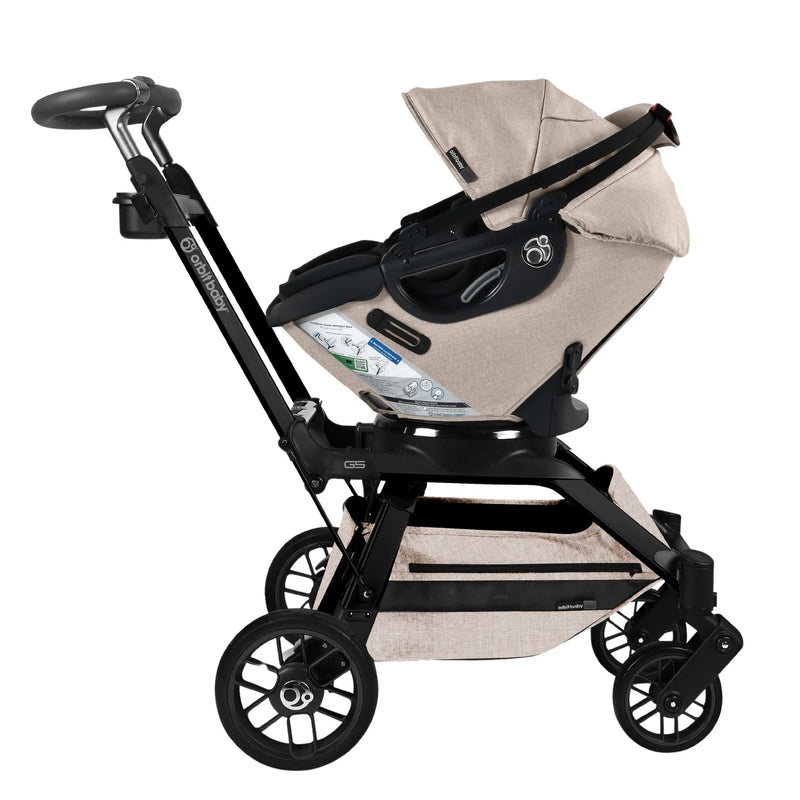 Orbit Baby Stroll & Ride Travel System in Melange Flax/Black combines modern design and practicality as a versatile stroller carseat combo.