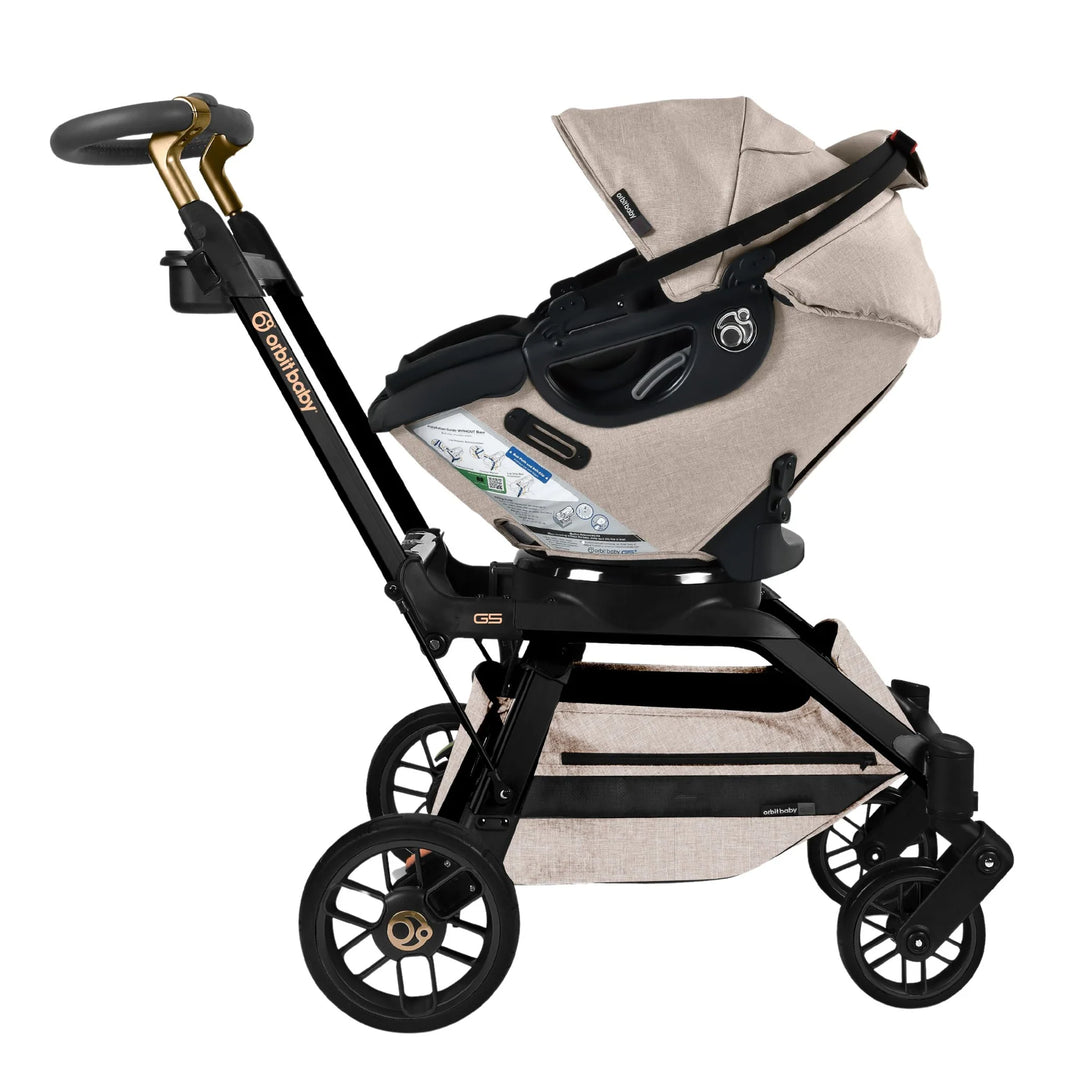 Melange Flax/Black Luxe Orbit Baby Stroll & Ride Travel System ensures comfort and smooth handling as a best stroller car seat option.