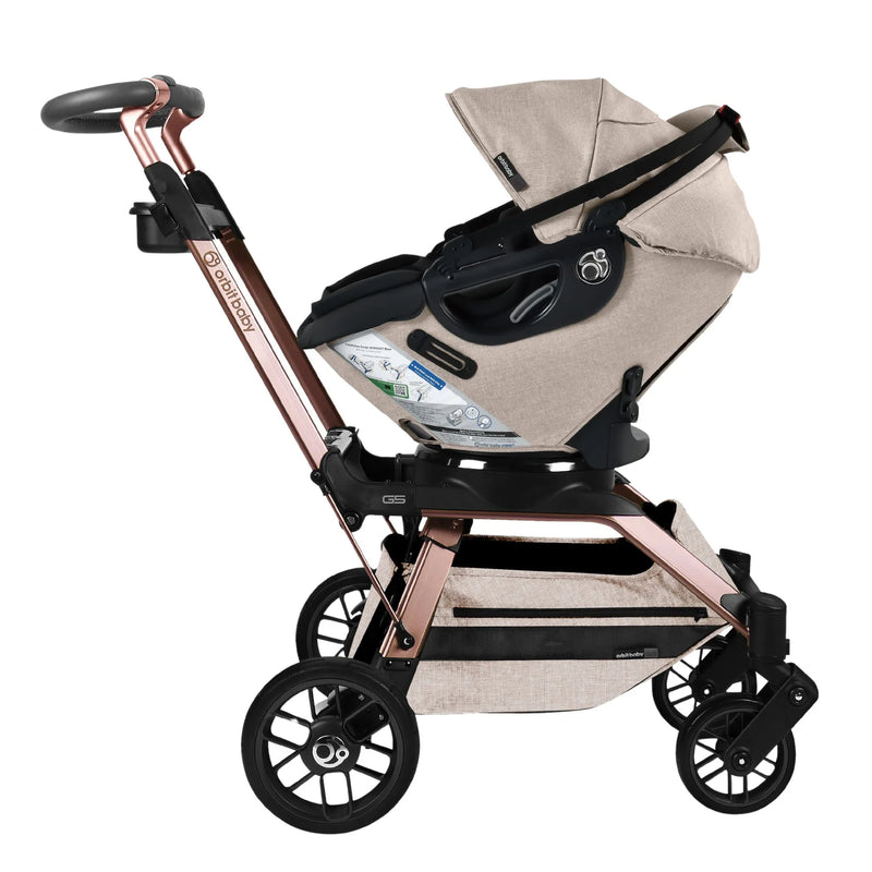 The Orbit Baby Stroll & Ride Travel System in Melange Flax/Rose Gold delivers dependable rides and effortless style as a stroller carseat solution.