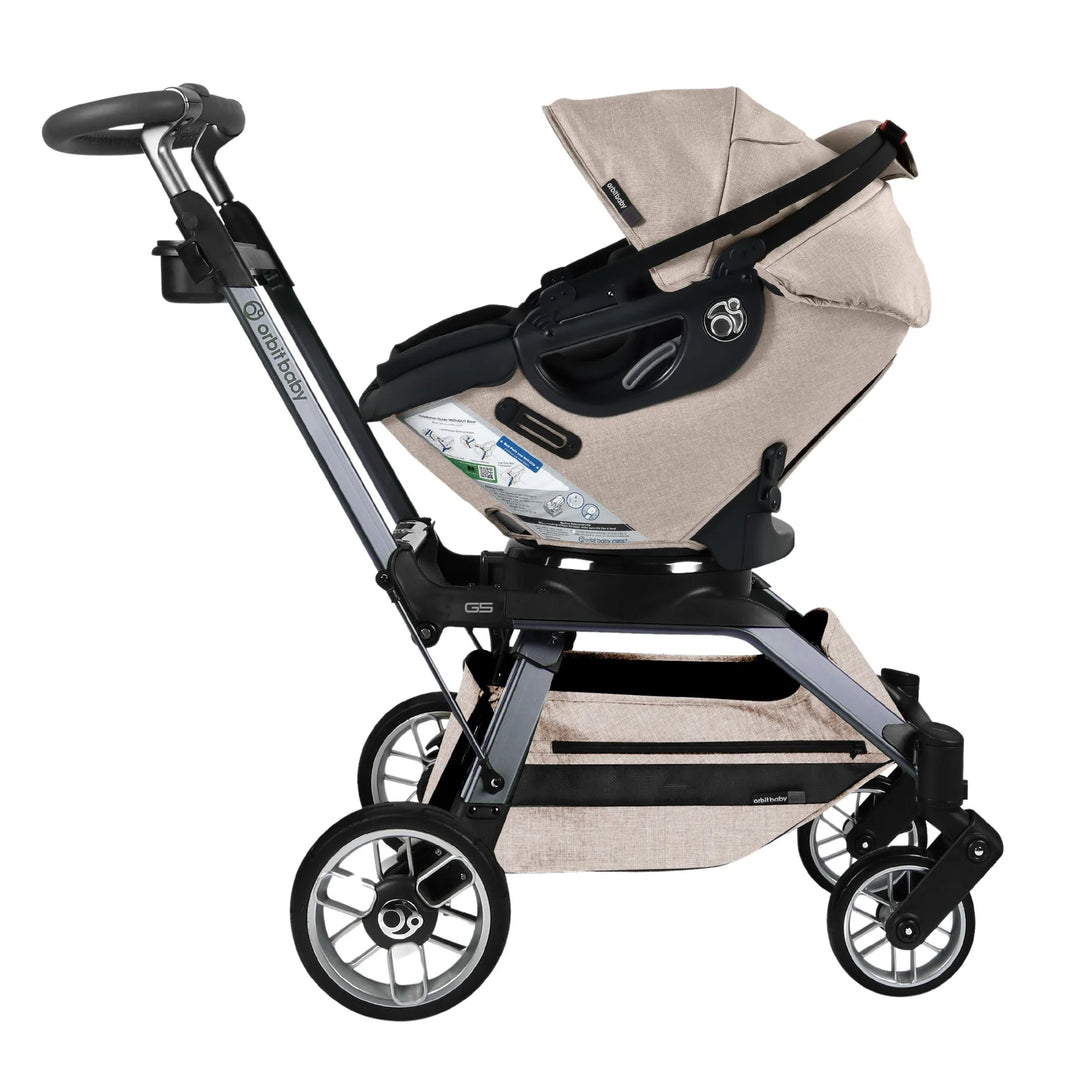 Orbit Baby Stroll & Ride Travel System in Melange Flax/Titanium ensures smooth rides and durability as a premium stroller travel system.