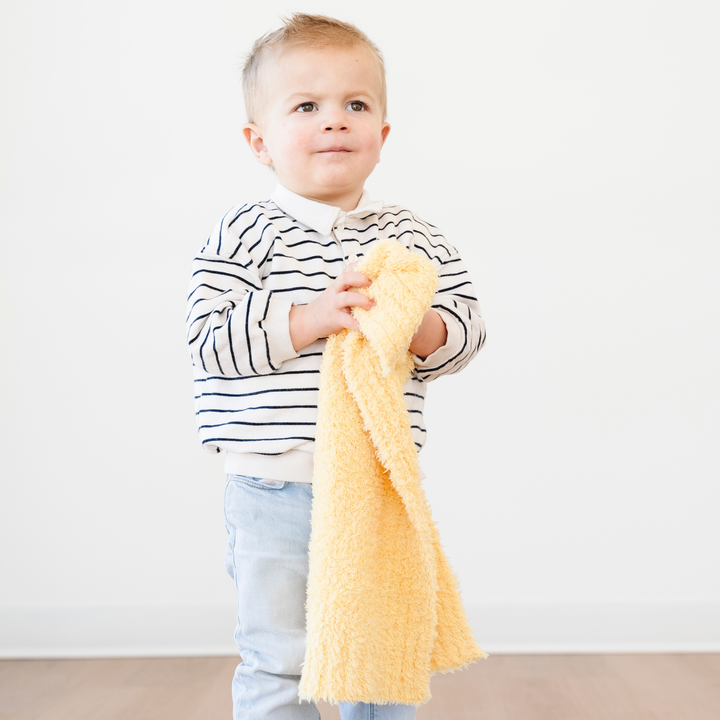 Wrap your little one in comfort with the Saranoni BAMBONI¨ Mini Blanket in Sunburst, the best baby blanket for everyday snuggles.