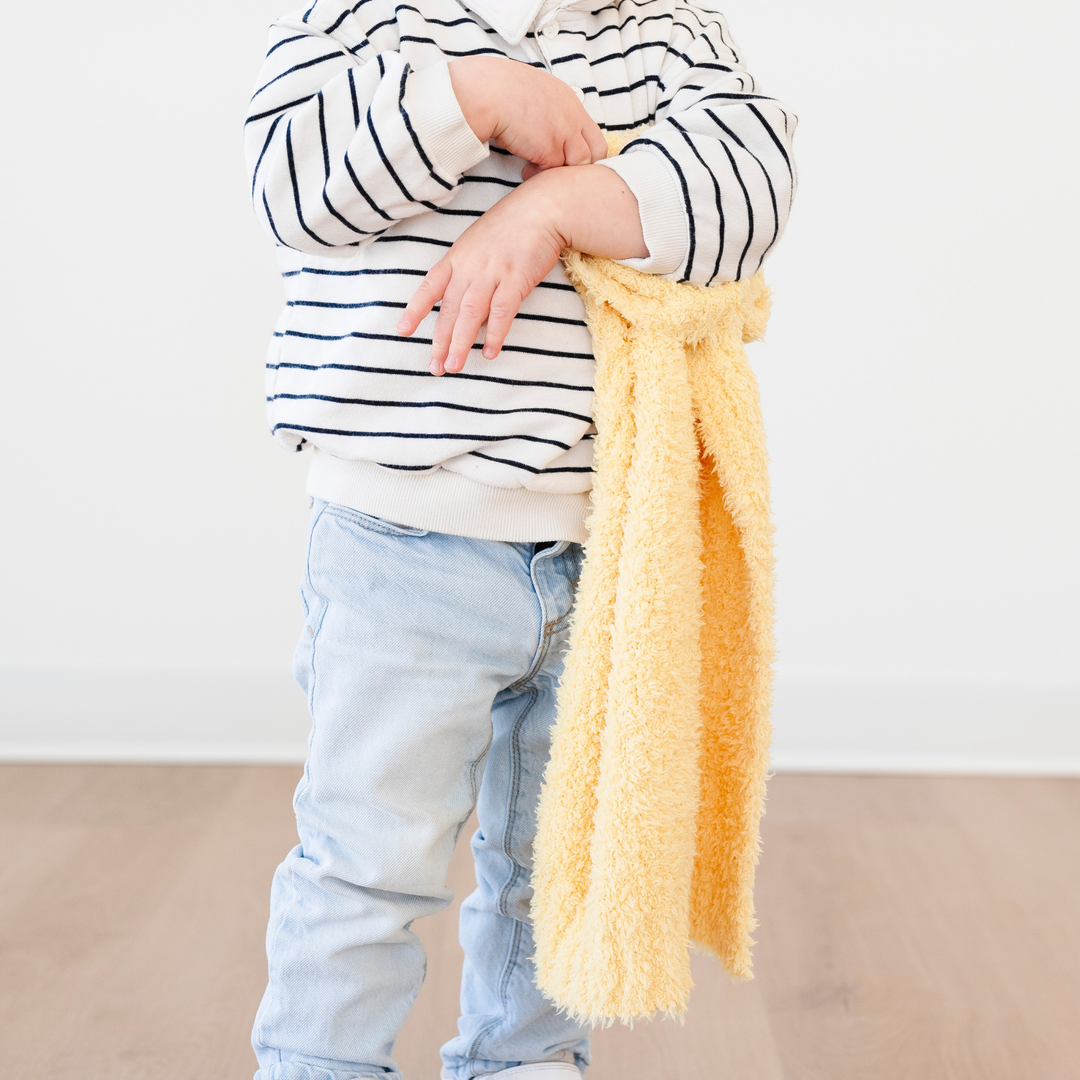 Soft and sweet, the Saranoni BAMBONI¨ Mini Blanket in Sunburst is a must-have baby girl blanket for nursery or travel.